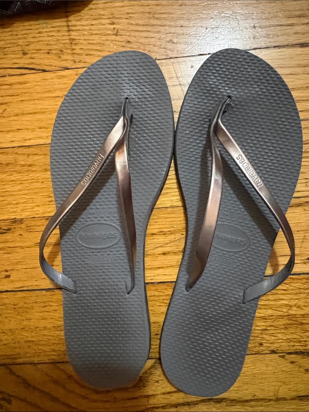 Havaianas Slim Flip Flops in Charcoal with Metallic Bronze Straps